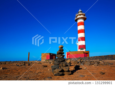 Toston lighthouse in El Cotillo at Fuerteventura Toston lighthouse in El Cotillo at Fuerteventura 131299901