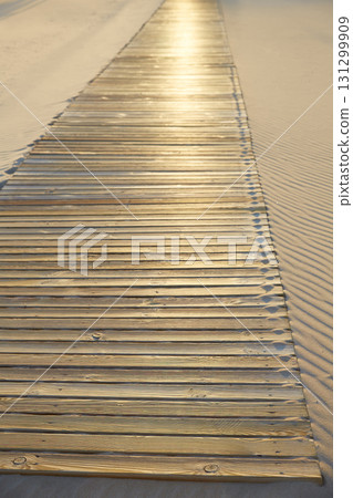 Beach wooden walkway and sand dunes texture 131299909