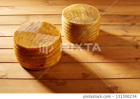 Manchego cheese from Spain in wooden table 131300234