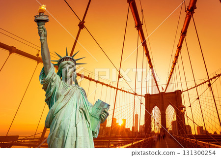 Liberty Statue and Brooklyn bridge New York 131300254