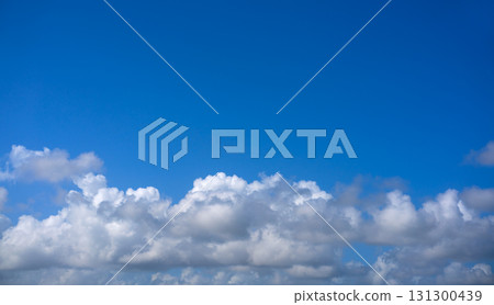 Blue summer sky with cumulous clouds 131300439