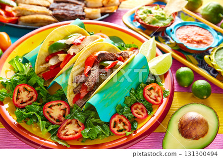 Mexican chicken and beef fajitas tacos 131300494
