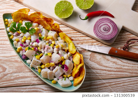 Ceviche peruvian recipe with fried banana 131300539