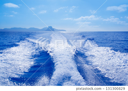 Es Vedra and Vedranell islands boat wake Es Vedra and Vedranell islands boat wake 131300829