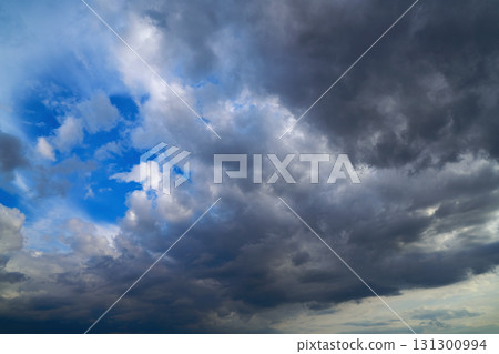 Dramatic clouds sky in a stormy weather 131300994