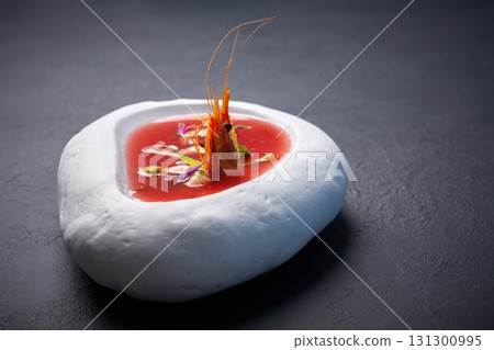 Mediterranean tomato soup with seafood 131300995