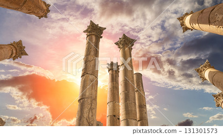 Roman Columns in the Jordanian city of Jerash (Gerasa of Antiquity), capital and largest city of Jerash Governorate, Jordan. Against the background of a beautiful sky with clouds 131301573