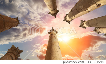 Roman Columns in the Jordanian city of Jerash (Gerasa of Antiquity), capital and largest city of Jerash Governorate, Jordan. Against the background of a beautiful sky with clouds 131301598