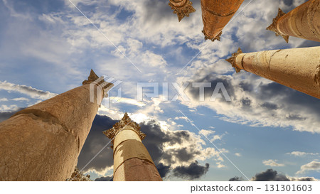 Roman Columns in the Jordanian city of Jerash (Gerasa of Antiquity), capital and largest city of Jerash Governorate, Jordan. Against the background of a beautiful sky with clouds 131301603