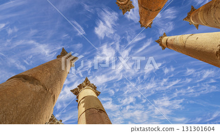 Roman Columns in the Jordanian city of Jerash (Gerasa of Antiquity), capital and largest city of Jerash Governorate, Jordan. Against the background of a beautiful sky with clouds Roman Columns in the Jordanian city of Jerash (Gerasa of Antiquity), capital and largest city of Jerash Governorate, Jordan. Against the background of a beautiful sky with clouds 131301604