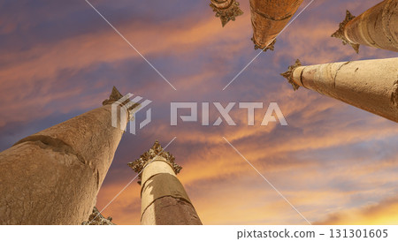 Roman Columns in the Jordanian city of Jerash (Gerasa of Antiquity), capital and largest city of Jerash Governorate, Jordan. Against the background of a beautiful sky with clouds 131301605
