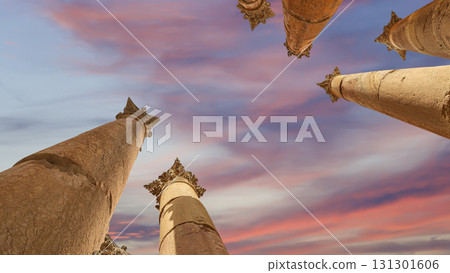 Roman Columns in the Jordanian city of Jerash (Gerasa of Antiquity), capital and largest city of Jerash Governorate, Jordan. Against the background of a beautiful sky with clouds 131301606