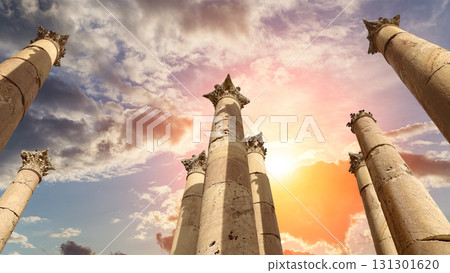 Roman Columns in the Jordanian city of Jerash (Gerasa of Antiquity), capital and largest city of Jerash Governorate, Jordan. Against the background of a beautiful sky with clouds Roman Columns in the Jordanian city of Jerash (Gerasa of Antiquity), capital and largest city of Jerash Governorate, Jordan. Against the background of a beautiful sky with clouds 131301620