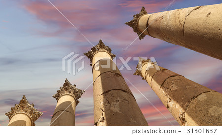 Roman Columns in the Jordanian city of Jerash (Gerasa of Antiquity), capital and largest city of Jerash Governorate, Jordan. Against the background of a beautiful sky with clouds 131301637
