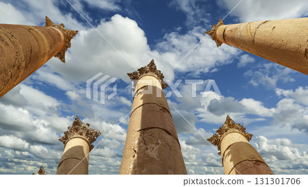 Roman Columns in the Jordanian city of Jerash (Gerasa of Antiquity), capital and largest city of Jerash Governorate, Jordan. Against the background of a beautiful sky with clouds 131301706