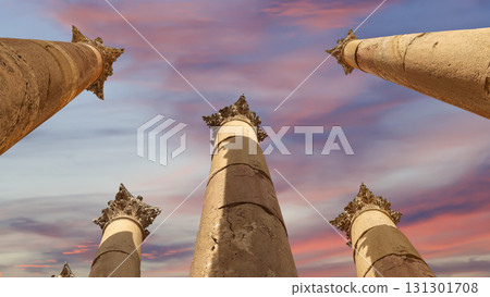 Roman Columns in the Jordanian city of Jerash (Gerasa of Antiquity), capital and largest city of Jerash Governorate, Jordan. Against the background of a beautiful sky with clouds 131301708