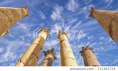Roman Columns in the Jordanian city of Jerash (Gerasa of Antiquity), capital and largest city of Jerash Governorate, Jordan. Against the background of a beautiful sky with clouds 131301714