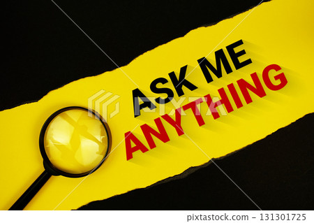 Ask Me Anything text on yellow with black paper torn ripped and magnifying glass Ask Me Anything text on yellow with black paper torn ripped and magnifying glass 131301725