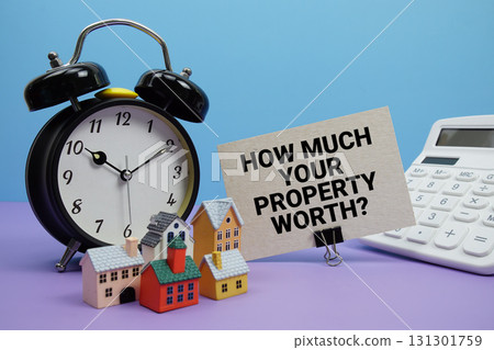 How Much Your Property Worth? phrase with Calculator, alarm clock, Model Houses Real Estate Financial Concept How Much Your Property Worth? phrase with Calculator, alarm clock, Model Houses Real Estate Financial Concept 131301759