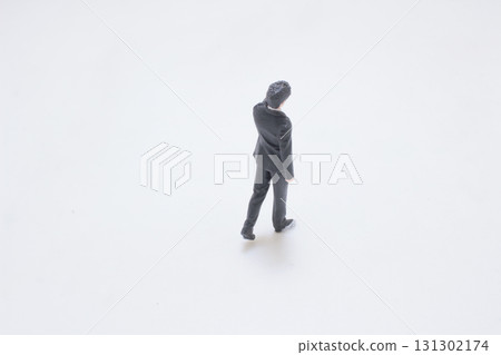 Miniature Businessman Figurine Standing in Black Suit Miniature Businessman Figurine Standing in Black Suit 131302174