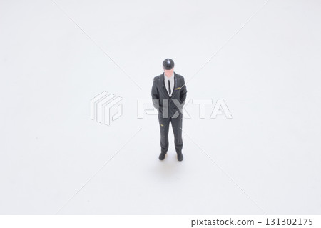 Miniature Businessman Figurine Standing in Black Suit Miniature Businessman Figurine Standing in Black Suit 131302175