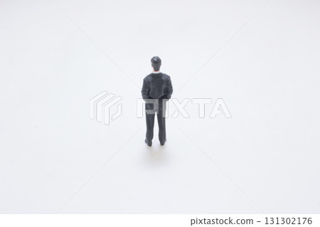 Miniature Businessman Figurine Standing in Black Suit Miniature Businessman Figurine Standing in Black Suit 131302176
