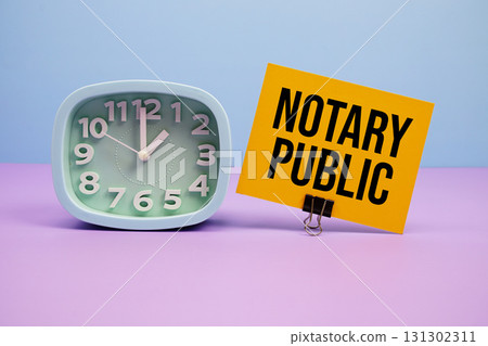 Notary Public text and alarm clock on blue and purple background Notary Public text and alarm clock on blue and purple background 131302311