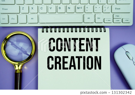 Notepad with the text "Content Creation" with white keyboard, wireless mouse and magnifying glass on purple background Notepad with the text "Content Creation" with white keyboard, wireless mouse and magnifying glass on purple background 131302342