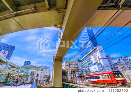 Yokohama cityscape in Japan, including Yokohama Station, JR Yokohama Tower, and Keikyu trains Yokohama cityscape in Japan, including Yokohama Station, JR Yokohama Tower, and Keikyu trains 131302760