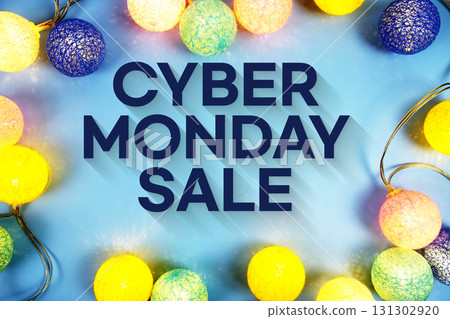 Cyber Monday Sale text with LED Light Cotton ball Decoration on blue  background 131302920