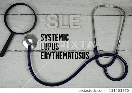SLE Systemic Lupus Erythematosus text with Stethoscope on wooden background SLE Systemic Lupus Erythematosus text with Stethoscope on wooden background 131303870