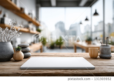 Minimal wooden table with blurred cafe interior in background 131303932