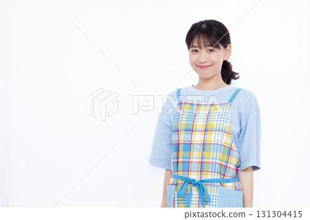 Housewife in apron Housewife in apron 131304415