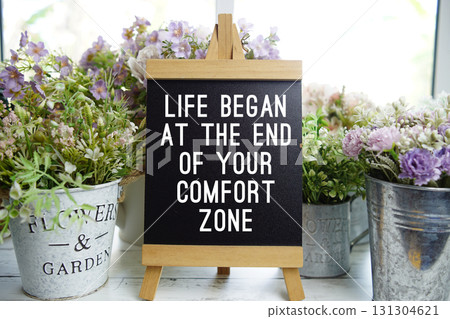 Easel with  Motivational And Inspirational Quotes "Life Began At The End Of Your Comfort Zone" 131304621