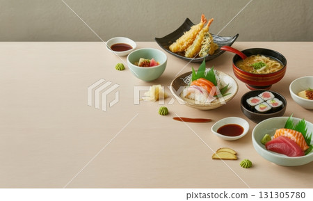 Diverse spread of traditional japanese dishes including sushi, sashimi, tempura, and udon 131305780