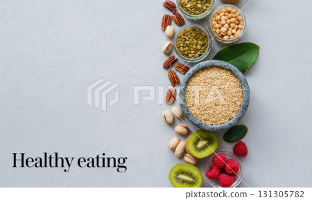 Healthy eating concept with diverse fruits, nuts, seeds, and legumes, top view 131305782