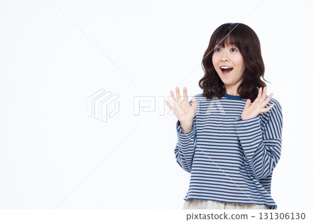 A woman smiling and surprised 131306130