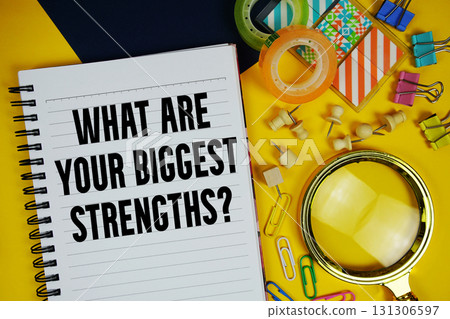 What Are Your Biggest Strengths? text with magnifying glass and stationery on yellow background What Are Your Biggest Strengths? text with magnifying glass and stationery on yellow background 131306597