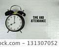 Time and Attendance text with alarm clock on white background 131307052