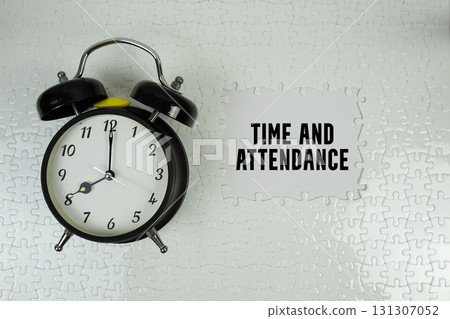Time and Attendance text with alarm clock on white background 131307052