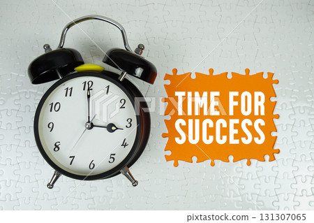 Time for Success text with alarm clock on orange background 131307065