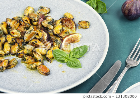 Fried seafood on a plate, mussels. Fried seafood on a plate, mussels. 131308000