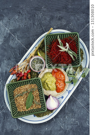 Collection of seasonings and herbs. 131308010
