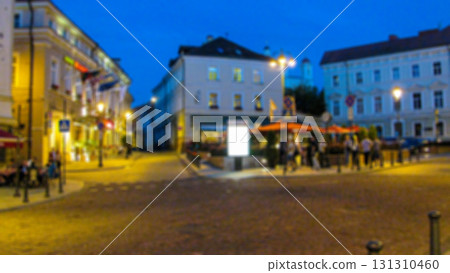 Urban evening landscape. Tourism and travel theme creative abstract blurred background with bokeh effect Urban evening landscape. Tourism and travel theme creative abstract blurred background with bokeh effect 131310460