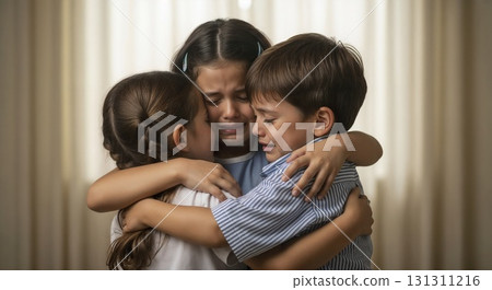 Children hug warmly, sharing joy and affection. 131311216