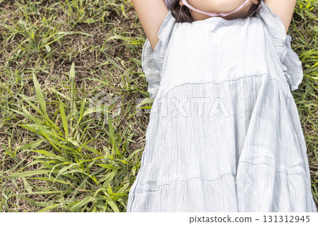 Girl lying on the grass (Japanese, 5 years old, faceless) Girl lying on the grass (Japanese, 5 years old, faceless) 131312945
