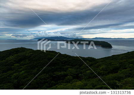 Early morning clouds cleared and visibility improved over the Wakayama Kitan Strait. Cumulus clouds floating above Awaji Island. 131313736