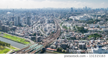 Aerial view of Tokyo, taken from above the Arakawa River or towards Akabane. Panorama Aerial view of Tokyo, taken from above the Arakawa River or towards Akabane. Panorama 131315163