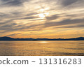 The sea where the setting sun goes down 131316283