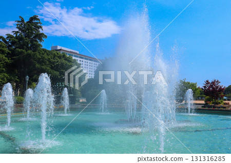 Wadakura fountain park with blue sky spread 131316285